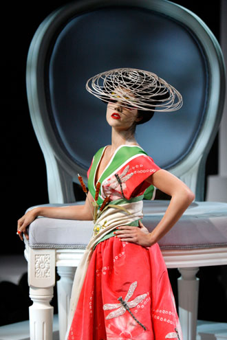 A model presents a creation by British designer John Galliano as part of French fashion house Dior's Spring-Summer 2007 Haute Couture collection in Paris, January 22, 2007. 