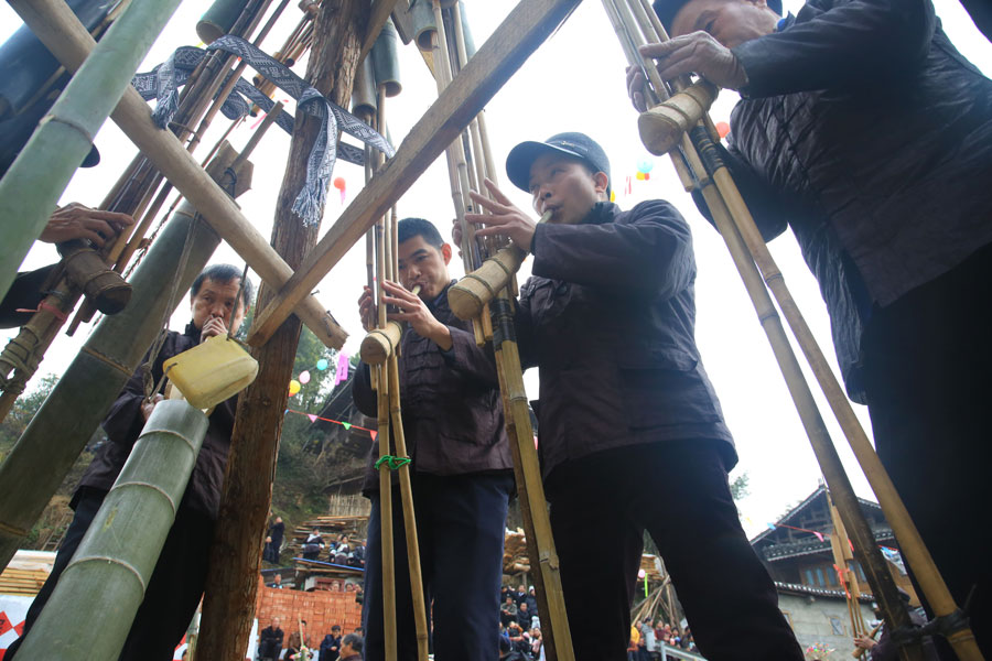 Dong people perform for traditional New Year festival