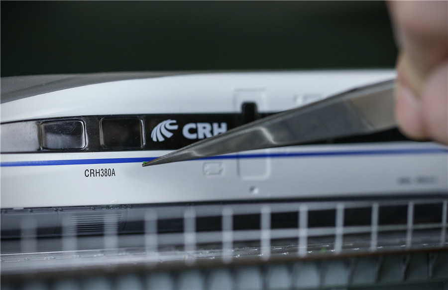 Railway conductor builds lifelike train models